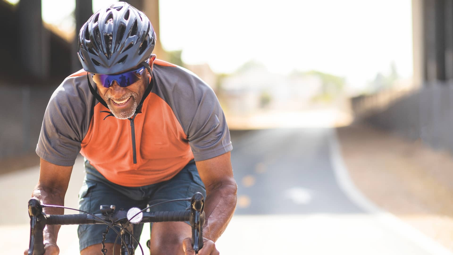 Man riding 10 speed bike