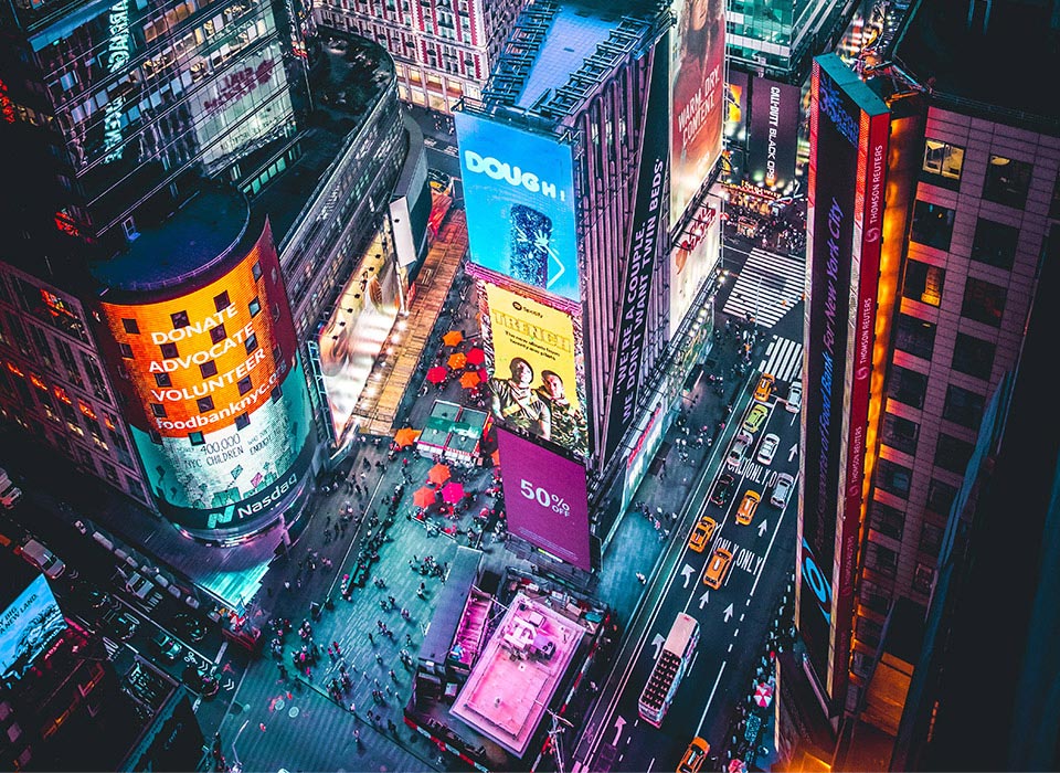 View from above of buildings with digital billboards